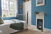 The Fourth Bedroom is arranged as a welcoming guest retreat
